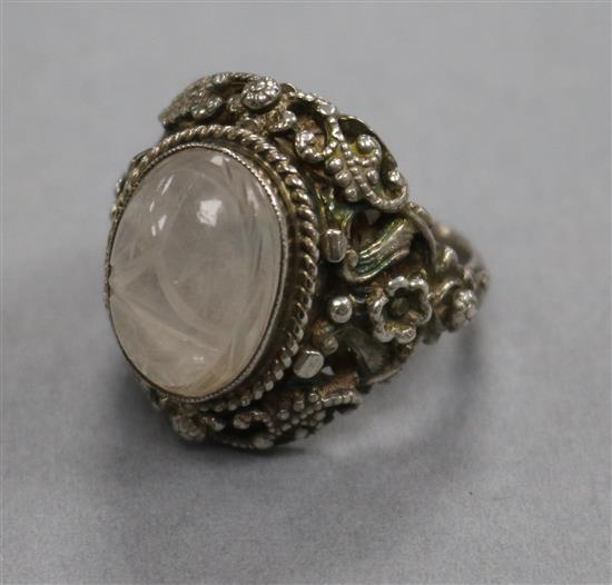 An Austro-Hungarian? white metal and carved cabochon set poison ring,